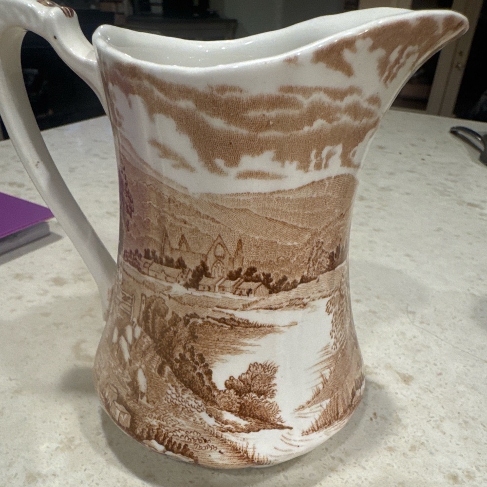Scenic Brown and White Ceramic Pitcher
